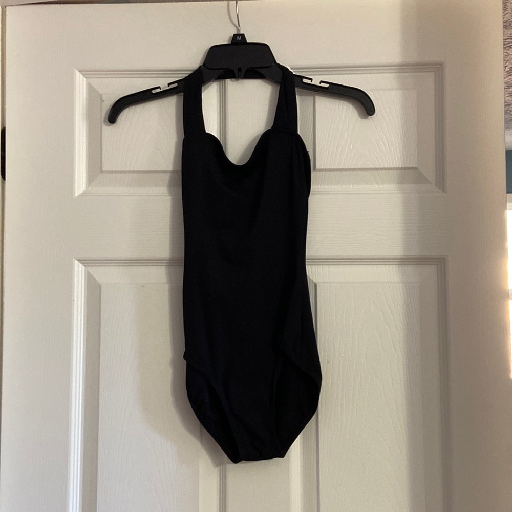 Black halter body suit.